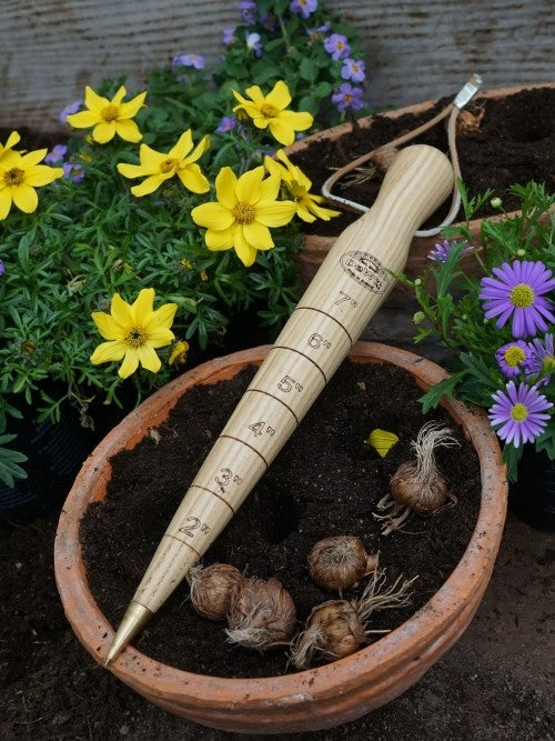 Dibber i treverk med messingtupp