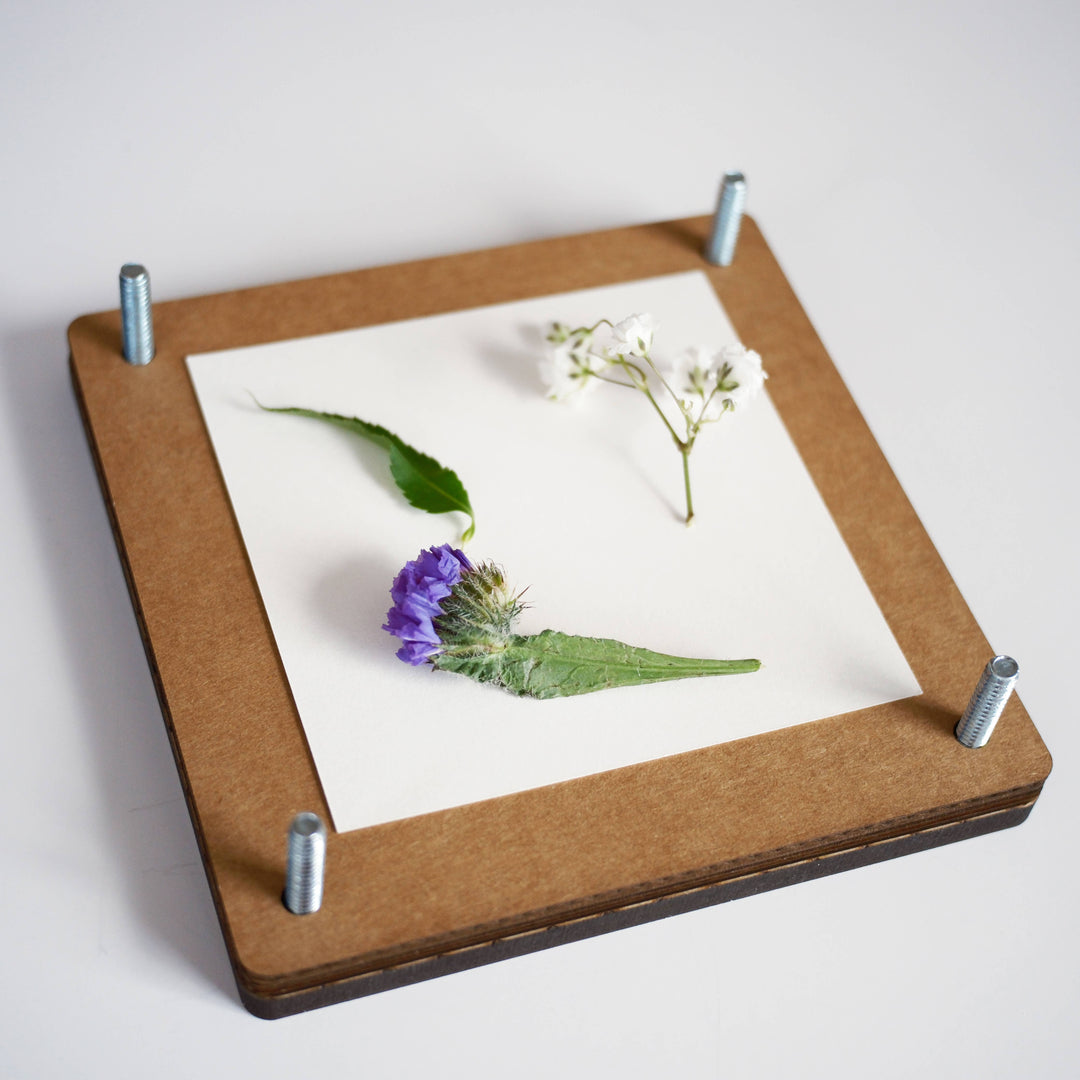 Blomsterpresse i tre