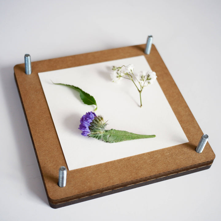 Blomsterpresse i tre