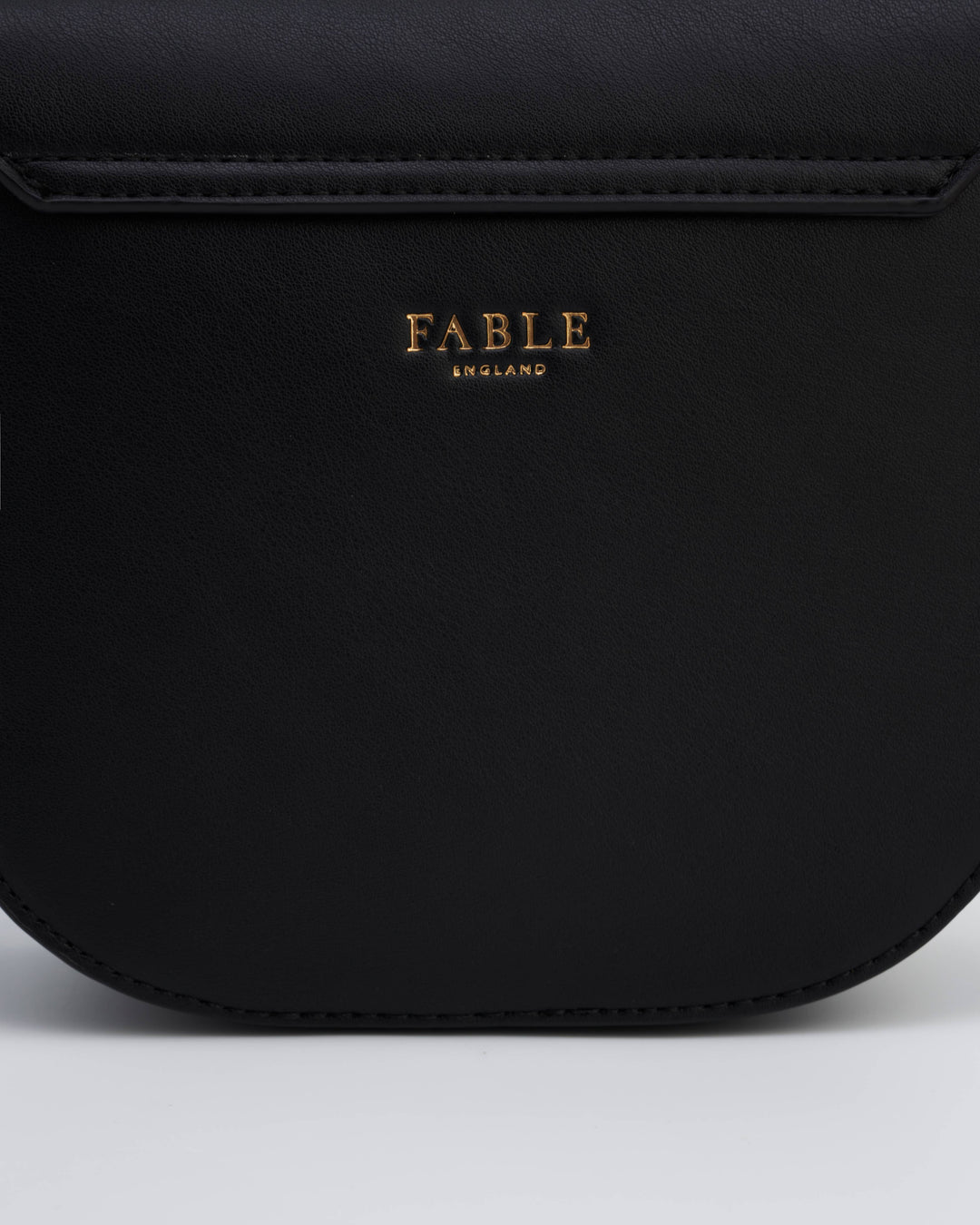 Beth Saddle Crossbody - sort